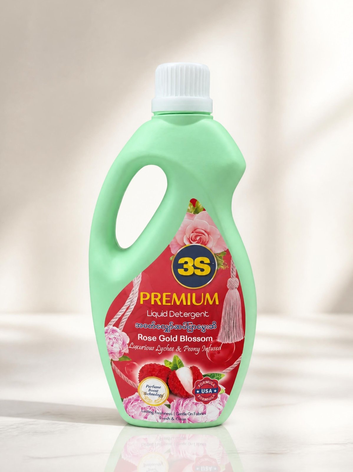 Rose Gold Blossom liquid detergent with its red floral and lychee label